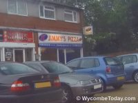Incident of affray involving men with large knives at entrance to pizza takeaway shop in Downley