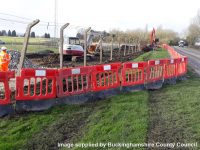Temporary traffic lights on A41 at construction site of new Westcott roundabout from Monday 10th February 2020